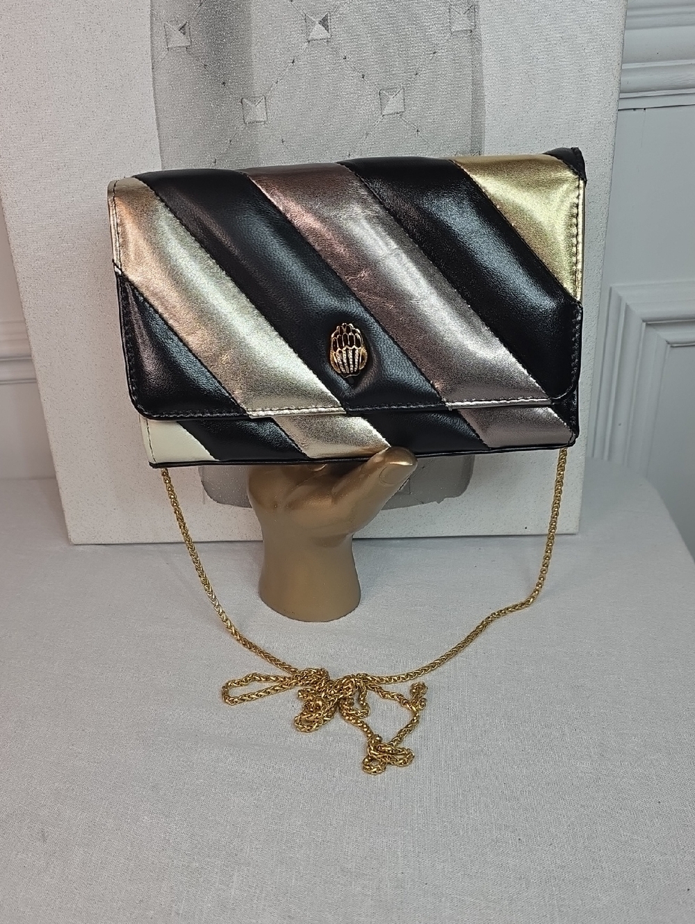 Kurt Geiger Black, Gold & Silver Diagonal Stripe Fold-Over Clutch With Strap